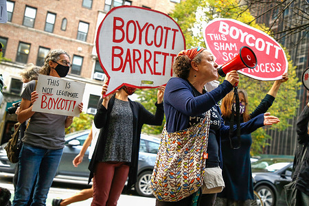 A protester speaks through a megaphone during the demonstration.
Protesters voice their discontent and cite that the confirmation hearings were illegitimate and demands for further action by the Democrats to boycott the vote. Democrats are preparing to boycott the Senate Judiciary Committee's Thursday vote on Supreme Court nominee Amy Coney Barrett, a gesture that Committee Chair Lindsey Graham (R-S.C.) has already indicated he will ignore.