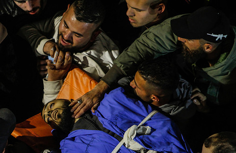 (EDITOR'S NOTE : Image depicts death)
Palestinians carry the body of one of six Palestinians who were killed by Israeli army bullets during a raid on the occupied West Bank Jenin camp. Large forces of the Israeli army stormed the Jenin camp and destroyed a shelter in which 6 armed Palestinians were holed up, including the Palestinian Abdel-Fattah Khrusheh, who carried out the shooting attack on an Israeli settler in his town, Hawara, on February 28. The Palestinian Ministry of Health said that 6 Palestinians were killed during this raid.