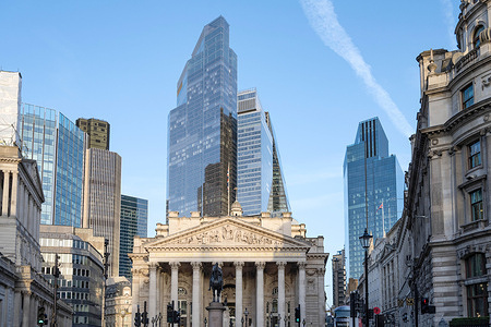 The Royal Exchange building flanked by Threadneedle Street and The Bank of England in the heart of the City of London, financial and commercial heart of the capital, UK. london, united kingdom, england, britain, city, capital, business, banking, rate, interest, inflation, architecture, buildings, money, market, finance, financial, economy, city of london, financial district, history, historical, modern, copy space, corporate,
