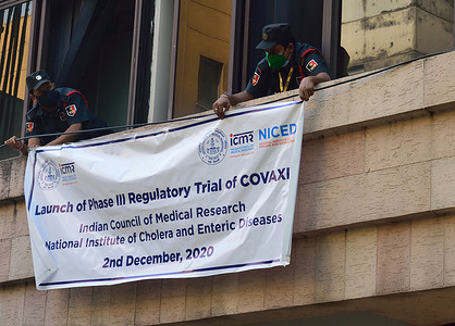 A banner reading "Launch of Phase 111 Regulatory Trial of COVAXI" is seen displayed at the Indian Council of Medical Research (ICMR).
West Bengal Governor, Jagdeep Dhankar inaugurates the launch of Third phase trial of Covaxine at the Indian Council of Medical Research (ICMR) in Kolkata.