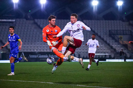 Jake Charlston of South Melbourne FC (L) clashes with Chad Nilson of Fremantle City FC (R) during the Hahn Australia Cup Round of 16 match between South Melbourne FC and Fremantle City FC at Lakeside Stadium. The game ended in a dramatic 3–3 draw after normal and extra time, with South Melbourne FC advancing after a 3–1 victory over Fremantle City FC in the ensuing penalty shootout.