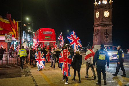 Far-right protesters march with flags by the Clock Tower during the rally. Dozens of activists from the Kent Anti-Racism Network, Care4Calais, and Stand Up To Racism gathered in Margate to counter a small anti-immigration rally organized by the United Kingdom Independence Party (UKIP). The counter-protest featured prominent “Refugees Welcome” banners and chanting aimed at drowning out the UKIP demonstration, which was part of a series of regional rallies calling for “mass deportations.” Local residents also joined the action, showing solidarity and stressing that the far-right rhetoric seen during the 2025 protest wave does not reflect the values of the coastal town.
