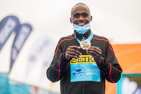 Jacob Kiplimo of Uganda with a gold medal of 2020 IAAF World Half Marathon Championships in Gdynia.