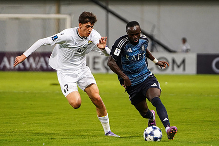 Al Nassr Senegalese forward Sadio Mane (R) seen in action with Al Zawraa Murad Muhammad (L) during the AFC Champions League 2 Group Stage match between Al Nassr (KSA) and Al Zawraa (IRQ) at Al Zawraa Stadium. Final score Al Nassr 2 : 0 Al Zawraa