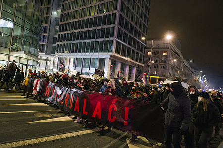 Protesters march through the Streets while holding a banner during the demonstration.
Hundreds took the streets in Warsaw to take part in a protest organized by the Women's Strike (Strajk Kobiet) against the ruling Law and Justice (PiS) party and the decision of the Constitutional Court. A Polish Constitutional Court verdict restricting access to abortion came into effect on January 27th, Poland’s government said, three months after it sparked nationwide protests.