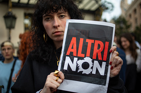 A protester holds a placard during a rally in front of the Congress of Deputies by the Ulloa Viva Ecologists in Action Platform and Greenpeace to demand that the Spanish government reject subsidizing the Altri multinational's mega-cellulose factory project and respect the will of the Galician people.