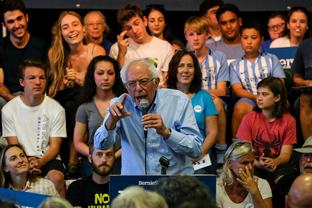 Democratic presidential candidate, Bernie Sanders discusses health care costs at an ice cream social in Raymond, New Hampshire hosted by Ben Cohen and Jerry Greenfield, the founders of Ben and Jerry’s Ice Cream.