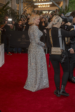 New York, United States - 05/05/2025 16:34:16: Pamela Anderson wearing Tory Burch departs the Pierre Hotel for 2025 Met Gala in New York City.