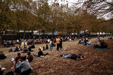 Festival-goers attend the last day of the Rock en Seine 2026 music festival at the Parc Saint-Cloud.