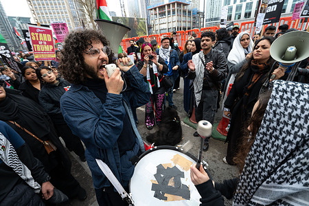 Protesters chant slogans during the rally. Anti-war protesters marched through central London during a demonstration organised by the Stop the War Coalition calling for an end to military action against Iran amid escalating conflict involving the United States and Israel. Demonstrators carried placards and Iranian flags while marching towards the US Embassy in London, chanting slogans opposing further escalation and urging governments to pursue diplomacy instead of war. Organisers said the rally aimed to highlight concerns about civilian casualties and the widening regional conflict.