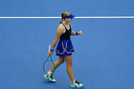 Mirra Andreeva of Russia celebrates winning against Nikola Bartunkova of Czech Republic (not in view) during the women's singles semi-final match on day eleven of China Open at the National Tennis Center.