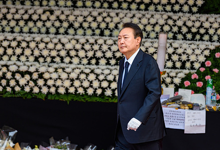 South Korean President Yoon Suk-yeol pays tribute in front of a joint memorial altar for victims of the deadly Halloween crowd surge, outside the city hall in Seoul. A weeklong period of national mourning has been declared through 5 November. At least 156 people, mostly in their 20s, were killed in a deadly crowd surge during Halloween celebrations in the popular nightlife district of Itaewon on 29 October night.
