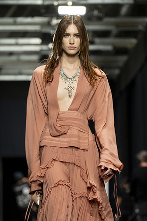 A model walks the runway at the Aniye Records fashion show during the Milan Womenswear Spring/Summer 2025.