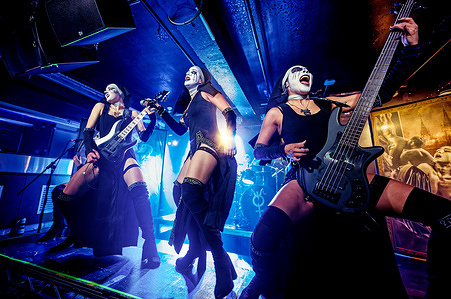 Left to right: Amber Maldonado (Lamia) guitarist, vocalist Grace Jane Pasturini (Lilith) and Lina De La Parra (Nixe) perform live at Club Academy. Cult rock band Dogma members performed at Club Academy, Manchester, UK