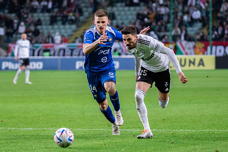 Maciej Wolski (L) of Stal and Filip Mladenovic (R) of Legia in action during the Polish PKO Ekstraklasa League match between Legia Warszawa and PGE FKS Stal Mielec at Marshal Jozef Pilsudski Legia Warsaw Municipal Stadium. Final score; Legia Warszawa 2:0 PGE FKS Stal Mielec.