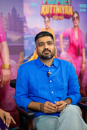 Jagdeep Sidhu Punjabi film director, writer, and screenwriter poses for photos during the press conference of his upcoming Punjabi movie Phaphey Kuttniyan.