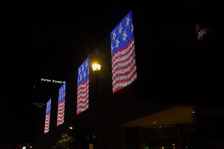 Programed lights shine patriotic flag images in downtown Toledo, Ohio during the festivities for the Fourth of July.
