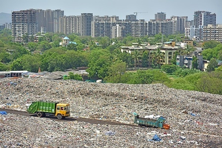 Trucks carry trash to Adharwadi Dumping ground.
Locals and NGO's have been demanding the closure of Dumping ground for years as every day, around 650 metric tons of waste is dumped there. Adharwadi dumping ground caught fire several times causing pollution and is the reason why Ulhas river is polluted besides Industrial zones. This has caused problems to residents living around on World Environmental Day.
