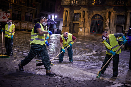 Operators from the Pavitec company apply an anti-slip product on the "Encierro" route, thus minimizing the risk of runners and bulls slipping during the "Encierros" of the San Fermin festivities.