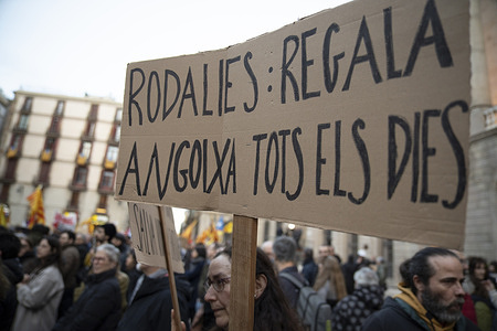 A protester holds a banner saying that delays in the commuter rail service cause her anxiety during the demonstration. A demonstration in central Barcelona calls for improvements to public rail services following recent accidents in Catalonia and Andalusia that have sparked a railway crisis in Spain.