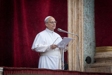 Pope Leo XIV recites the Angelus noon prayer from the central lodge of St. Peter's Basilica on the Solemnity of the Epiphany in Vatican City.