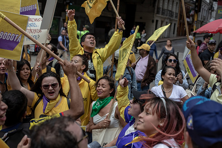 Members of the political party Alternative Democratic Pole on May Day.
A member of Radical Left Groups seen holding a flag during the May Day.
