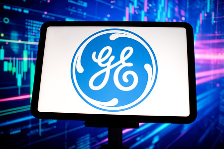 In this photo illustration, the General Electric (GE) logo is displayed on a tablet screen.