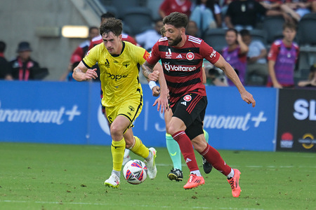Brandon Joel Gaetano Borrello (front) of Western Sydney Wanderers and Isaac Robert Hughes (back) of Wellington Phoenix FC seen in action during the 2024-25 Isuzu UTE A-League round 9 match between Western Sydney Wanderers FC and Wellington Phoenix at The CommBank Stadium. Final score Western Sydney Wanderers 4:1 Wellington Phoenix.
