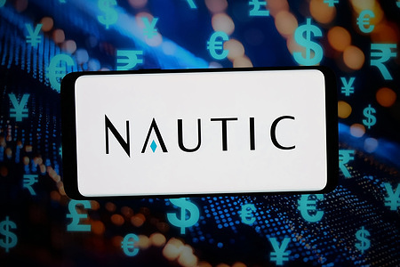 In this photo illustration, the logo of US private equity company Nautic Partners LLC is displayed on a smartphone in front of abstract background on computer screen.
