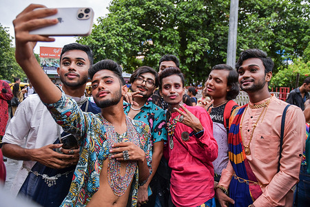 Gender rights activists and supporters of the LGBTQ community take a selfie during the pride parade in Kolkata. The LGBTQ community people organized a Pride Walk on the occasion of Pride Month in Kolkata. June is celebrated as LGBTQ pride month, creating awareness about their LGBTQ rights, promoting equality, honouring differences, fighting for justice and against discrimination.