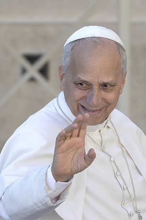 Pope Leo XIV greets the faithful from the popemobile as he leaves at the end of the Mass for the Jubilee of Catechists at St Peters' square.