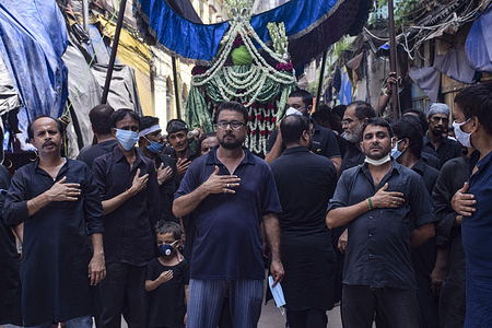 Muslims take part in a Muharram procession.
Muharram is the holy first month of the Muslim calendar. The first day of the month marks the Islamic New Year. On the 10th day of the Muharram month Imam Hussain Ali,the grandson of prophet Muhammad and third Imam Hussain of the Shia community, was killed in the battle of Karbala in 680 AD. Every year, Shias remember the sacrifice of Imam Hussain and his followers, and try to inculcate his message.