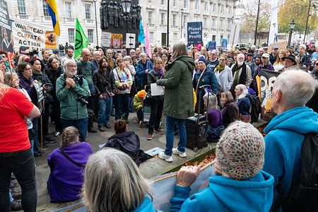 Protesters listen to speeches during the demonstration. During COP30 in Brazil a demonstration took place in Whitehall, London, as part of the global mobilisation “Don’t COP Out”. Organised by the Climate Justice Coalition, protesters called for urgent action on climate justice, economic inequality, environmental destruction, and human rights abuses, highlighting the need for systemic change and global solidarity.