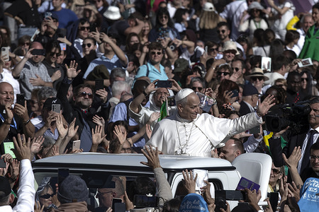 Pope Leo XIV greets a faithful at the end of a Mass for the Solemnity of All Saints and on the occasion of the Jubilee of Education in which he proclaimed St. John Henry Newman a Doctor of the Church in St. Peter's Square at the Vatican.
