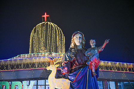 A view of the decorated and illuminated Holy Rosary Church in Tejgaon, Dhaka, as it celebrates Christmas Day.