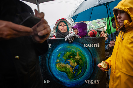 A woman is seen holding a big placard during the demonstration.
The largest climate strike in the Netherlands. This demonstration took place at the Dam square, in the center of Amsterdam. Thousands of people gathered to demand green energy affordable for everyone, big polluters have to pay their fair share, should be a fair distribution of the costs and benefits of the climate transition, and good green jobs.