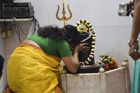 A devotee prays to Lord Shiva during the Maha Shivratri festival.
Maha Shivratri is one of the most popular Hindu festivals in India which is in honour of Lord Shiva. On this occasion millions of Shiva devotees keep a fast all day and pray through the night.