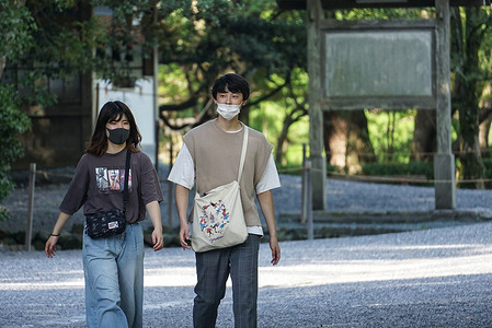 Tourists visit the Ise Jingu shrine while wearing face masks as a preventive measure during the Coronavirus (COVID-19) crisis.
Japanese government pushes the controversial "Go To Travel" discount campaign, promoting domestic travels since July to help the economy of the country.