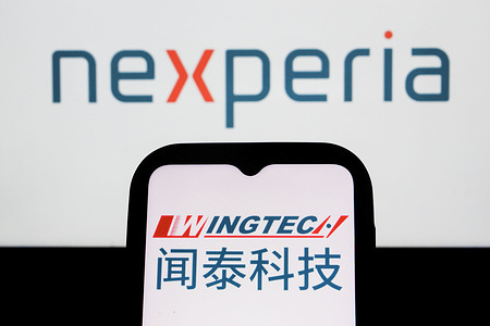 In this photo illustration, a WingTech logo is displayed on a smartphone with a Nexperia logo in the background.