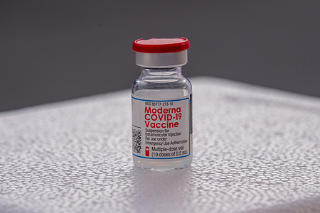 A vial containing Moderna COVID-19 vaccine by Moderna NIAID seen on display at pop-up vaccination site in Harlem, New York City.