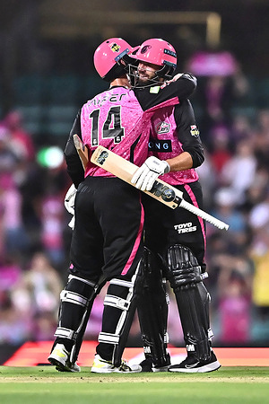 Jordan Silk and James Vince of Sydney Sixers celebrate after winning the Big Bash League match between Sydney Sixers and Melbourne Stars at Sydney Cricket Ground. Sydney Sixers win their Big Bash League match against Melbourne Stars at Sydney Cricket Ground by 8 wickets (11 balls remaining). Melbourne Stars: 194/9 (20 overs), Sydney Sixers 198/2 (18.1 overs).