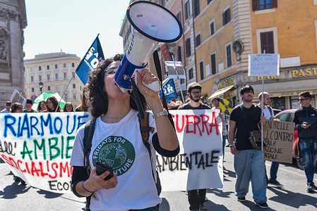 A protester shout slogans through a megaphone during the demonstration. Climate activists held a demonstration organized by Fridays For Future as part of the Global Climate Strike calling for action against climate change.