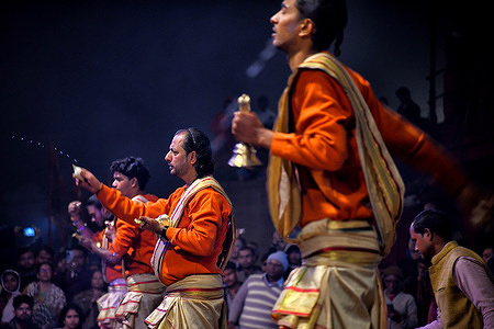 Hindu priests perform "Evening Aarati" prayers at Dashashwamedh Ghat, during the Ganga Aarti, a traditional and old Hindu ritual honoring the Ganges River which is held at the Banks of the river.