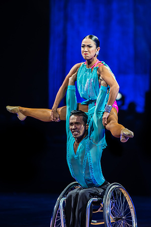 World Para Dance Sport champions Julius Obero and Rhea Marquez are seen performing a lift up during their floorshow at Melbourne Arena / John Cane Arena.