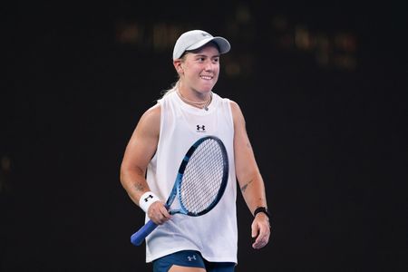 Sonay Kartal of UK celebrates her win against Elina Svitolina of Ukraine (Not in view) during their women's singles match on day 5 of Wuhan Open at the Optics Valley International Tennis Center. Sonay Kartal defeated Elina Svitolina with a score of 6-2, 2-6, 6-4.