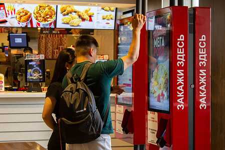 People make an order at a KFC restaurant in Moscow. KFC restaurants in Moscow will gradually rebrand to Rostic's. Rostic's brand opens its first restaurant at the location of the former KFC branch in Moscow. In July 2022, the media reported that Yum! Brands, the owner of KFC and Pizza Hut in Russia, was ending its operations in the country and transferring ownership to a local operator. Recently, it was announced that the former KFC establishments in Russia will now operate under the Rostic's brand. Meanwhile, some KFC branches are still operating however, they will gradually shift their branding to Rostic's.