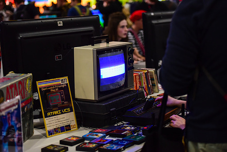 A Vintage Atari VCS personal home game console released in 1977 seen being used at Computer museum section of PAX Convention.