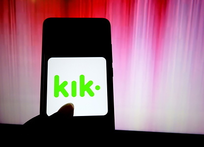 In this photo illustration a popular messenger application Kik logo seen displayed on a smartphone.