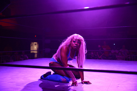 Mazzerati Lazarus reacts as Jaylee wrestles in a match against Mazzerati Lazarus during the Rival Showdown pro wrestling event at the National Guard Armory in Bloomington.