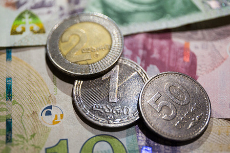 In this photo illustration, the Georgian lari coins are seen displayed. The Georgian lari (GEL) is the official currency of the country. The name lari is an old Georgian word denoting a hoard or property.